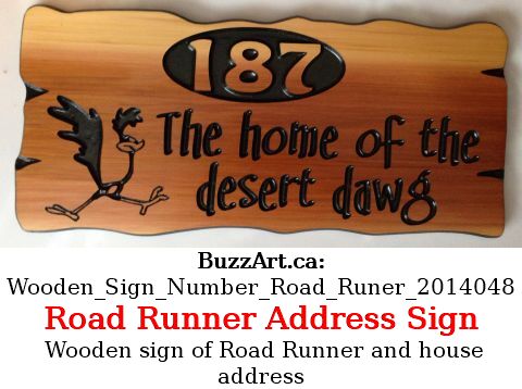 Wooden sign of Road Runner and house address